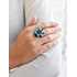 Strieborný prsteň s krištáľmi Swarovski modrý kvietok 35012.5